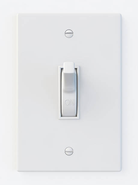 White light switch in the on position white light switch isolated on white background switching stock pictures, royalty-free photos & images