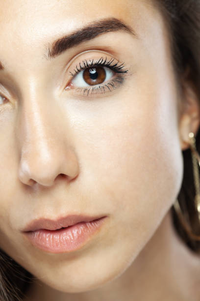 istock Beautiful brunette girl studio portrait. Serious face expression. 1362840093