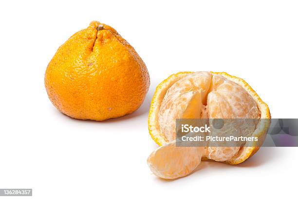 Whole And Partial Peeled Ugli Fruit Stock Photo - Download Image Now - Ugli, Fruit, Citrus Fruit