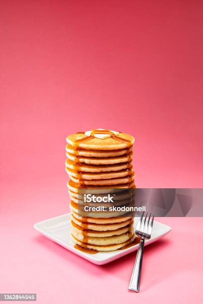 Big Tall Stack Of Pancakes On Pink Background Stock Photo - Download Image Now - Pancake, Food, Syrup