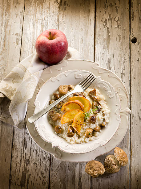 istock Risotto with apple and cep edible mushroom 136284732