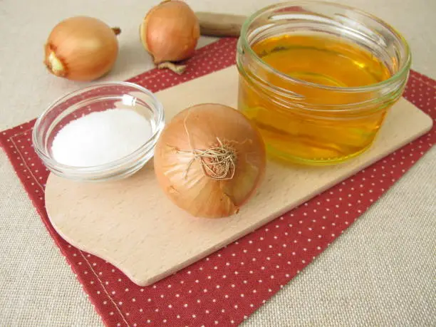 Fresh onion syrup, onion juice in a glass jar - Fresh onion syrup, onion juice from onions