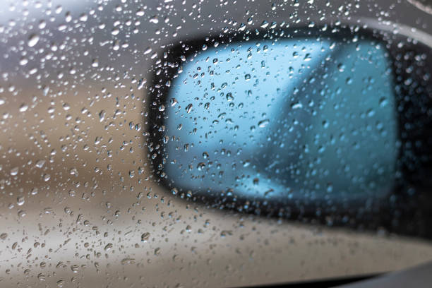 istock Car side glass view in raining with rain drops on it 1362866492