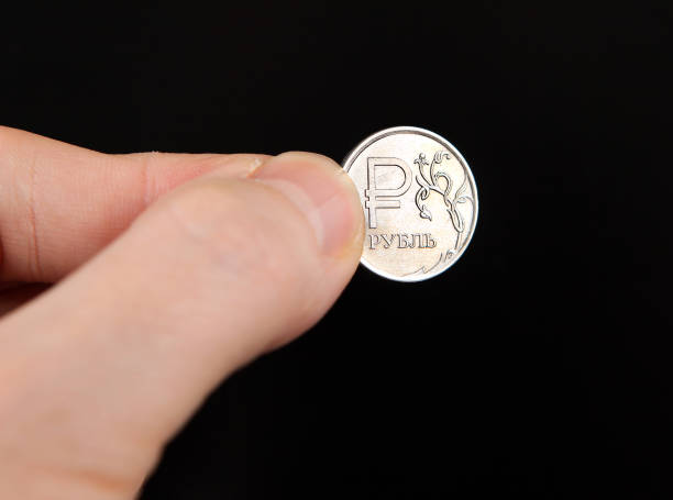 istock Russian Ruble in the Hand 1362867691