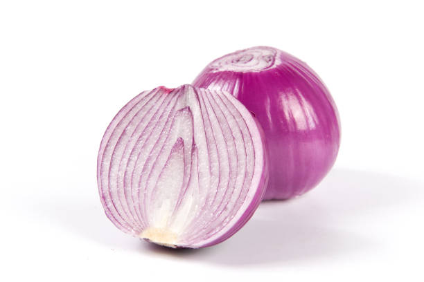 istock Red Onion and cut half isolated on white background 1362870327
