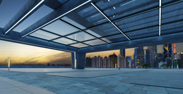 istock Perspective view of empty concrete floor and modern rooftop building 1362873195