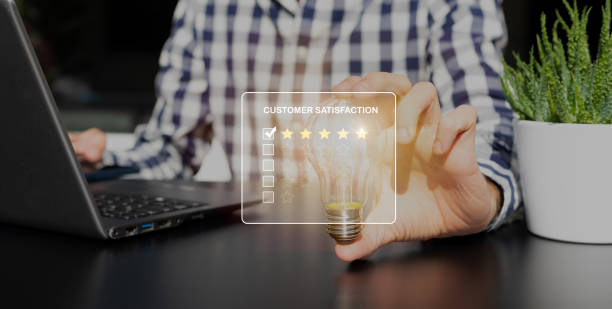 istock business man with a bulb in his hand 1362874621