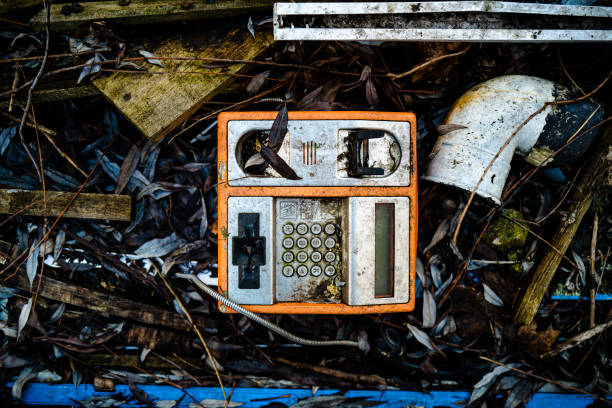 orange phone in prison cell