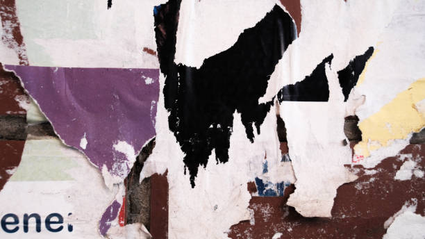 istock Ripped street poster background. Weathered paper abstract texture. 1362879598