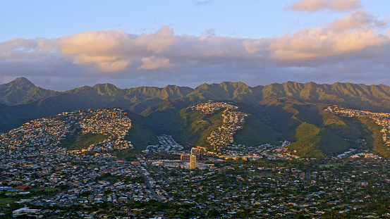 Aerial view of suburban residential districts with mountain range, Honolulu, Hawaii Islands, USA.