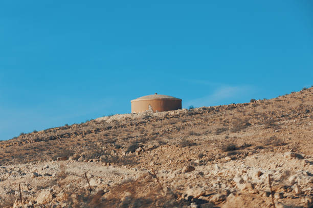 istock Water storage tank in desert 1362881755