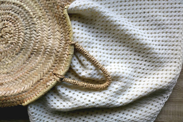 istock Straw Bag and Knitted Blanket 1362883981