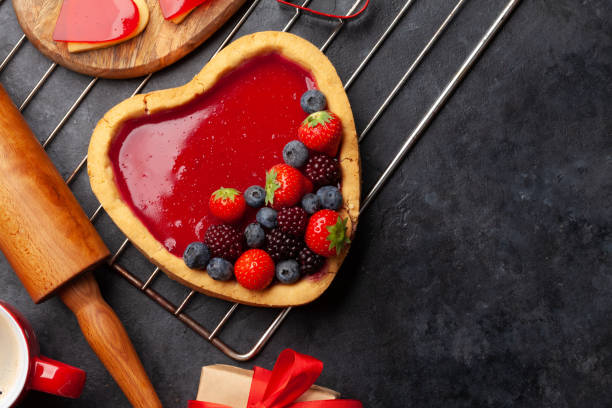 istock Heart shaped sweet cake with berries 1362884740