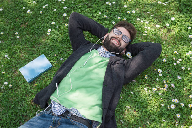 istock Student relaxing and listening to music 1362884802