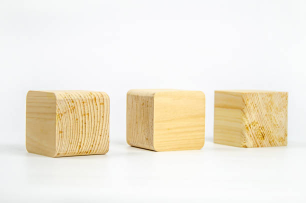 istock Wooden cubes from different tree species, different edge treatments. white background. Eco-friendly 1362887322