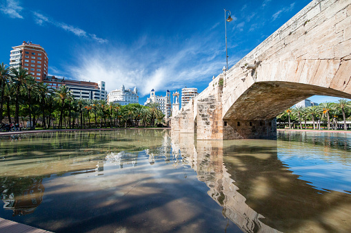 Puente de la Mar (Sea Bridge) at Turia Riverbed Park (Jardín del Turia - Tramo VIII) in Valencia, Spain. After a devastating flood in 1589, the destroyed wooden structure was replaced by a baroque style one between 1592-96