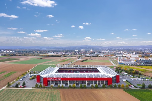 Mainz, Rhineland-Palatinate, Germany - October 2021: Aerial view over MEWA ARENA (1. FSV Mainz 05 Arena) at sunset, home stadium of the German Bundesliga football club Mainz 05.
