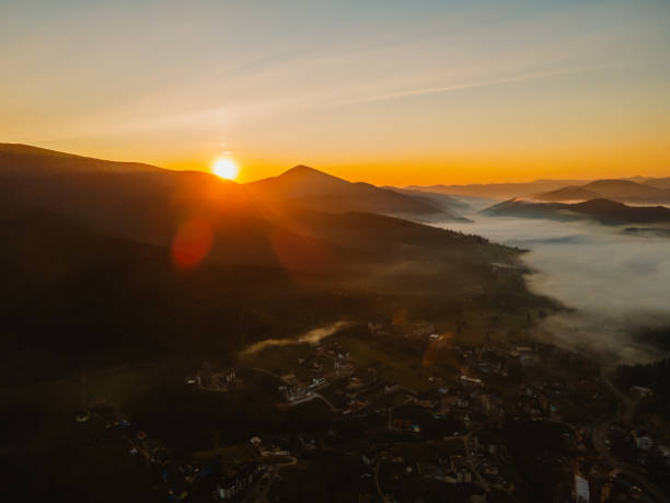 istock aerial view of sunrise above mountain range 1362890350
