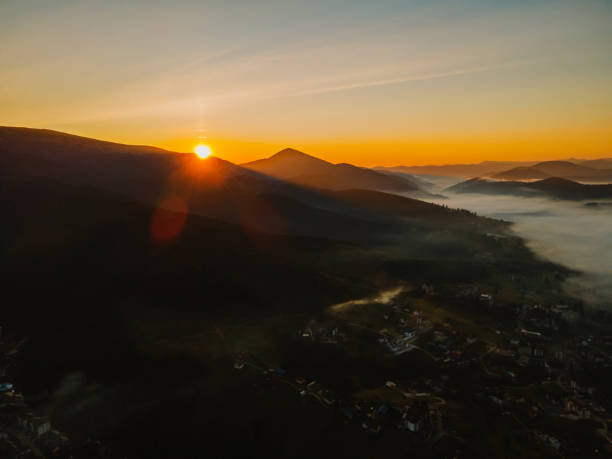 istock aerial view of sunrise above mountain range 1362890353