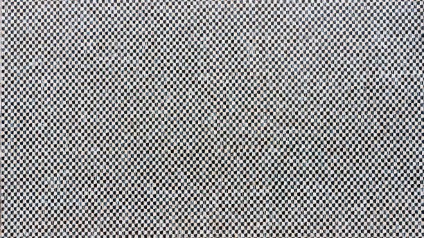 istock Black and white tile in street wall 1362890563
