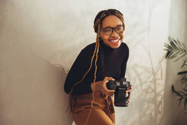 istock Artistic young photographer smiling in her office 1362890629