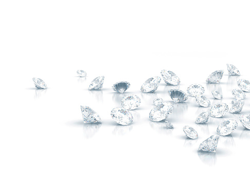 Diamonds scattered on white background