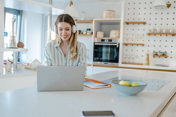 istock Relaxed working from home on laptop 1362891740