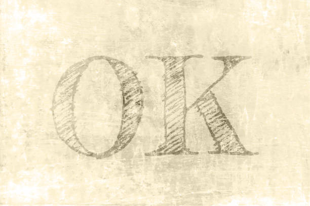 istock Old rustic grungy dirty stained pastel light beige or brown coloured smudged messy grunge wall textured effect wall like horizontal vector backgrounds or wallpaper with text  O K , OK 1362893311