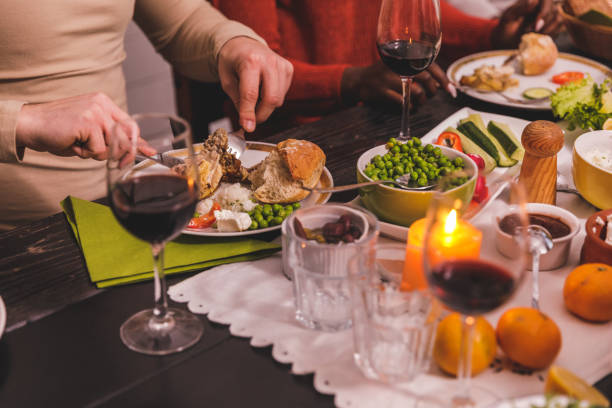 istock Unrecognizable man enjoying roast chicken during a Christmas dinner 1362894686