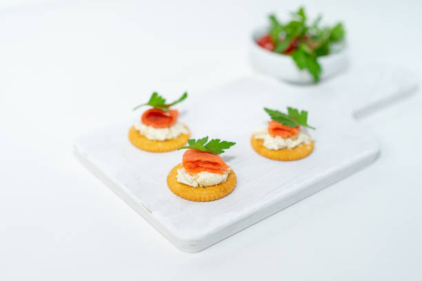 istock Crackers with fresh cheese and salmon 1362895004
