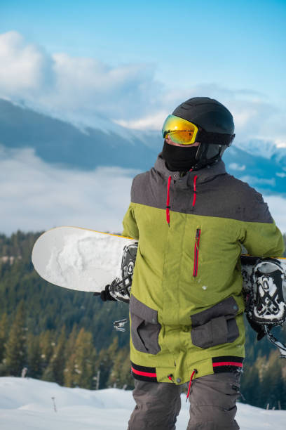 istock man snowboarder portrait carpathian mountains on background 1362895406