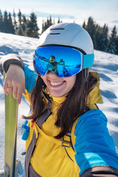 istock smiling skier woman portrait 1362895407