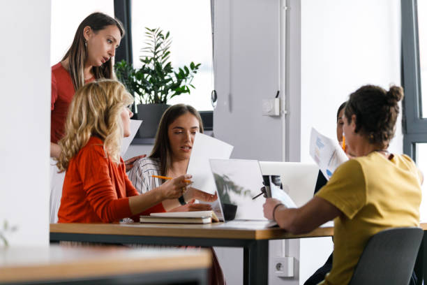 istock Group of business people having a project meeting, working as a team 1362896150