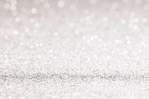 istock sparkles of Silver glitter abstract background. Copy space 1362896406
