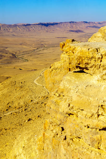 istock Cliff edge of Makhtesh (crater) Ramon, in the Negev Desert 1362897854