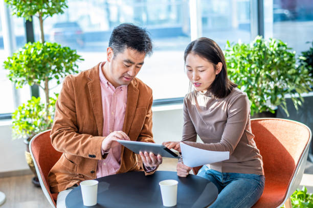 istock Asian business people working in office 1362899385