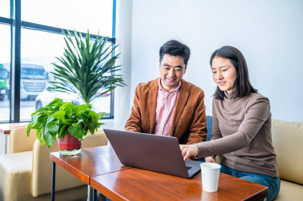 istock Asian business people working in office 1362899427