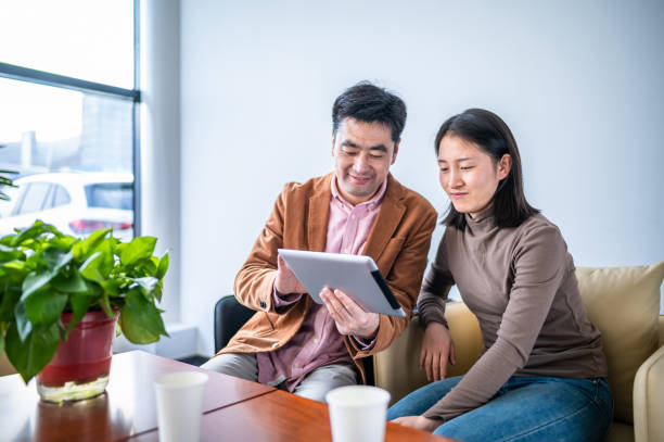 istock Asian business people working in office 1362899460