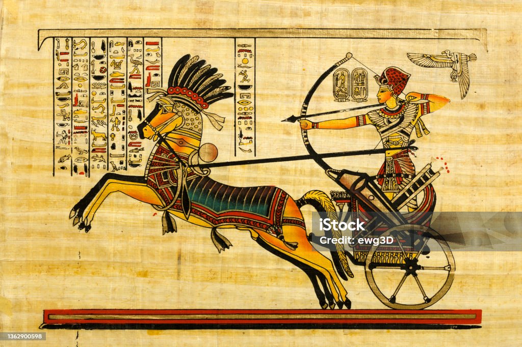 Pharaoh in the chariot - Egyptian souvenir papyrus Pharaoh in the chariot - Egyptian souvenir papyrus with with elements of egyptian history and religion Egypt Stock Photo