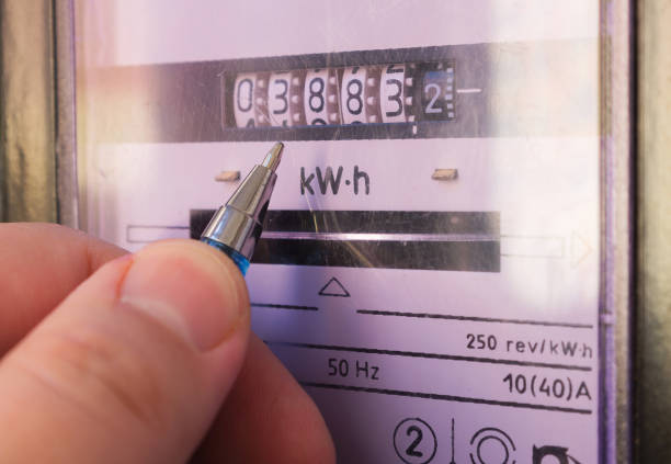 Ballpoint pen showing electricity meter readings. stock photo