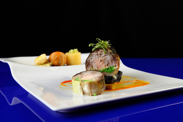 istock chef's fine dining seafood and beef presentation 1362902839