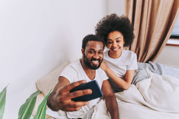 istock Afro american couple in bed at home 1362905627