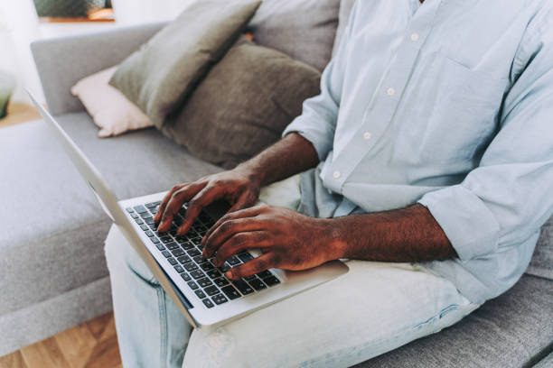 istock Afro american man working with computer laptop at home 1362910108