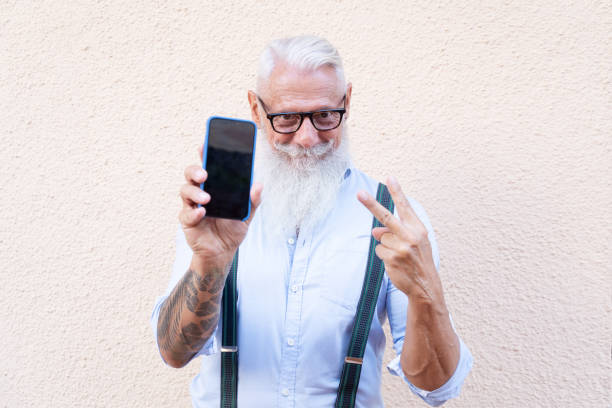 istock Senior man with a phone 1362911245