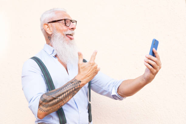 istock Senior man with a phone 1362911254