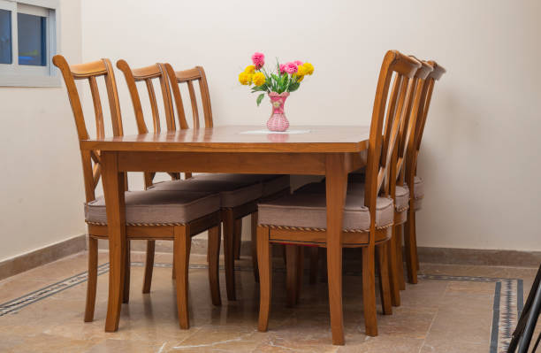 istock Home interior design with dining table and flower vase 1362911433