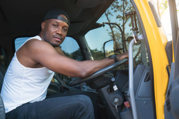istock truck driver man smiling confident in insurance cargo transport 1362912895
