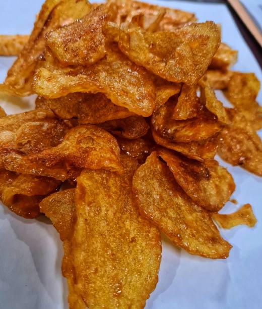 istock a snack made from thinly sliced ​​potatoes mixed with other ingredients and then fried 1362916755