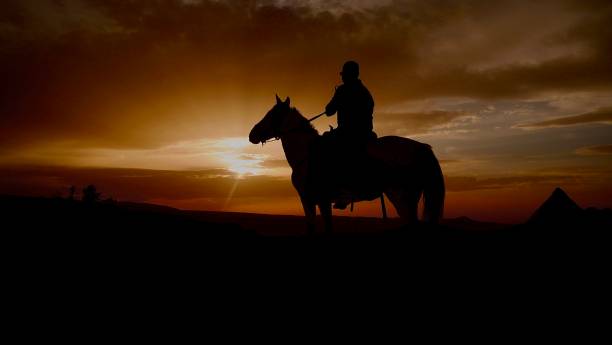istock Sunset - Horse rides in Cappadoccia 1362917283