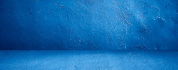 istock blue room interior cement floor and wall backgrounds for display products 1362918321